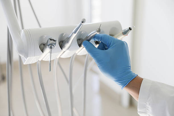 Professional Invisalign Clear Aligners technician working in Midland, WA